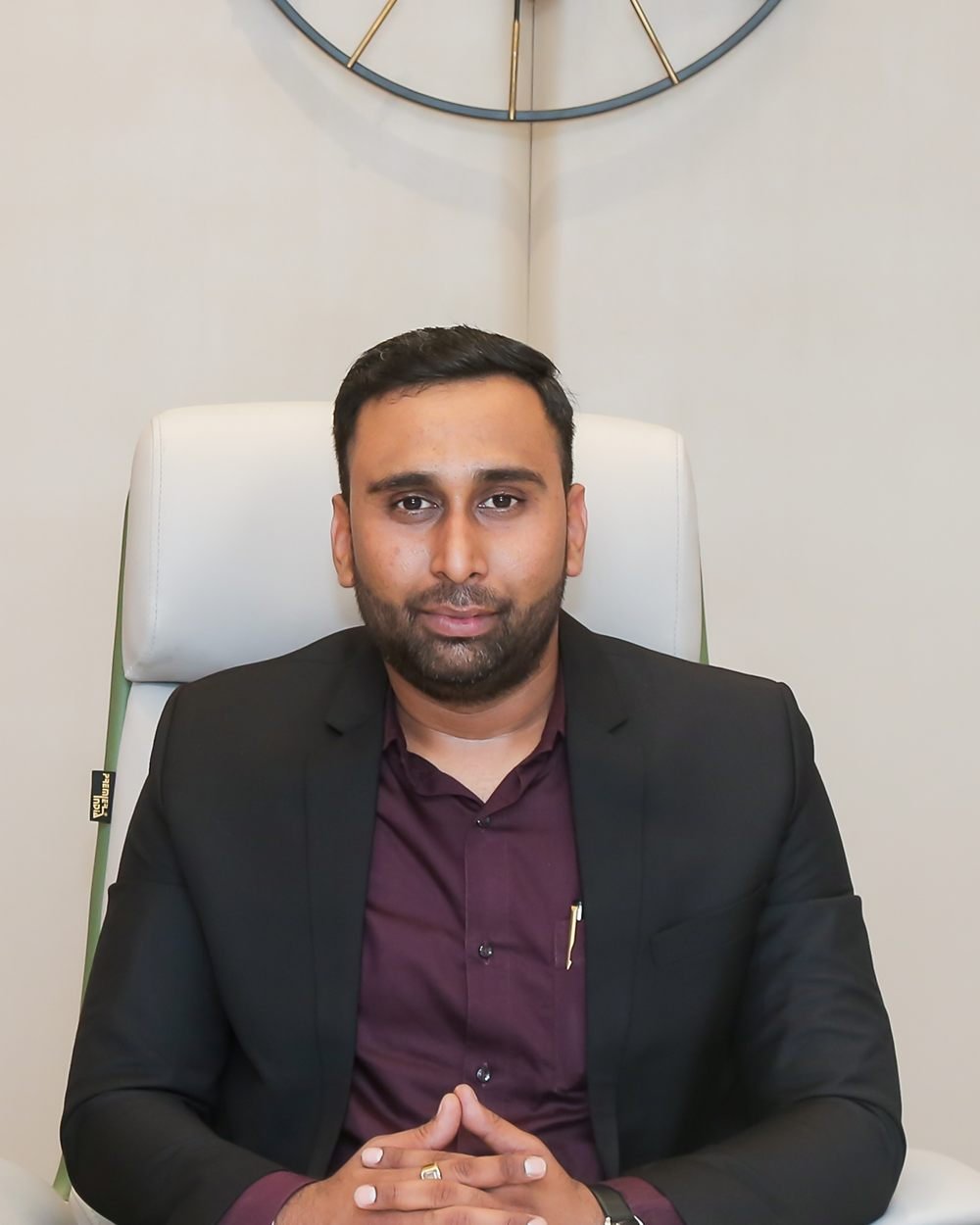 Mr. Dhaval D. Prajapati at his desk