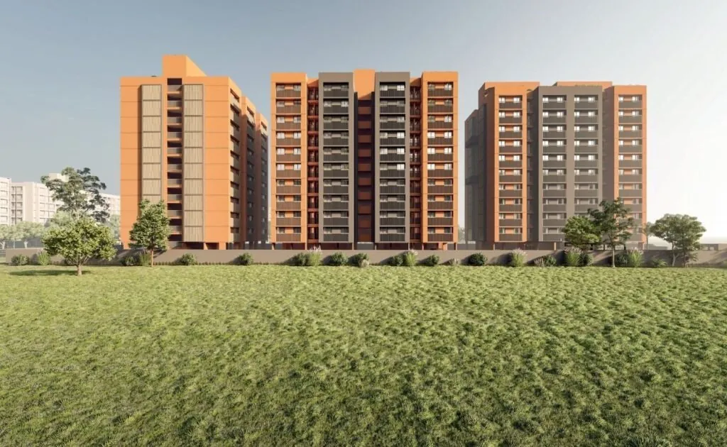 The three towers seen across an open lawn